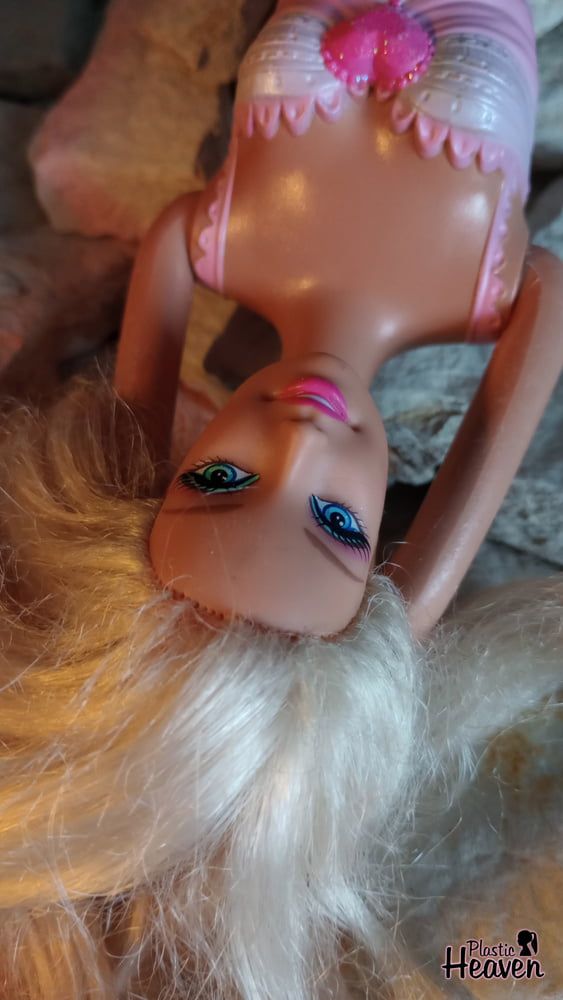 Barbie sunbathes after swimming in the ocean #6