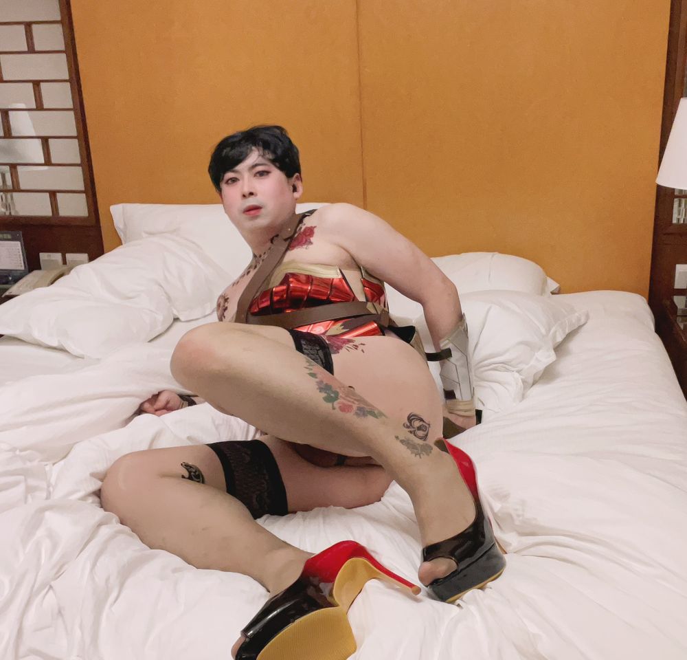 Asian sissy slut in wonder woman custome with tattoo #24