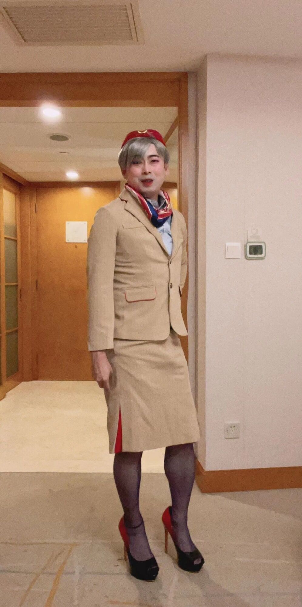 Asian femboy sissy in Emirates flight attendant dress #17