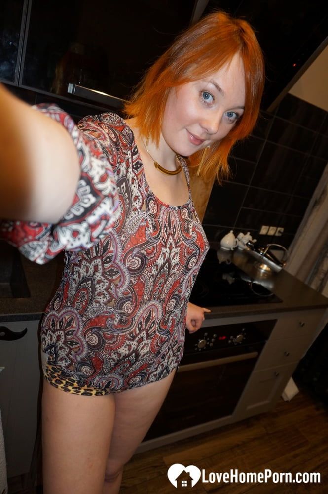Hot redhead knows how to tease on camera #13