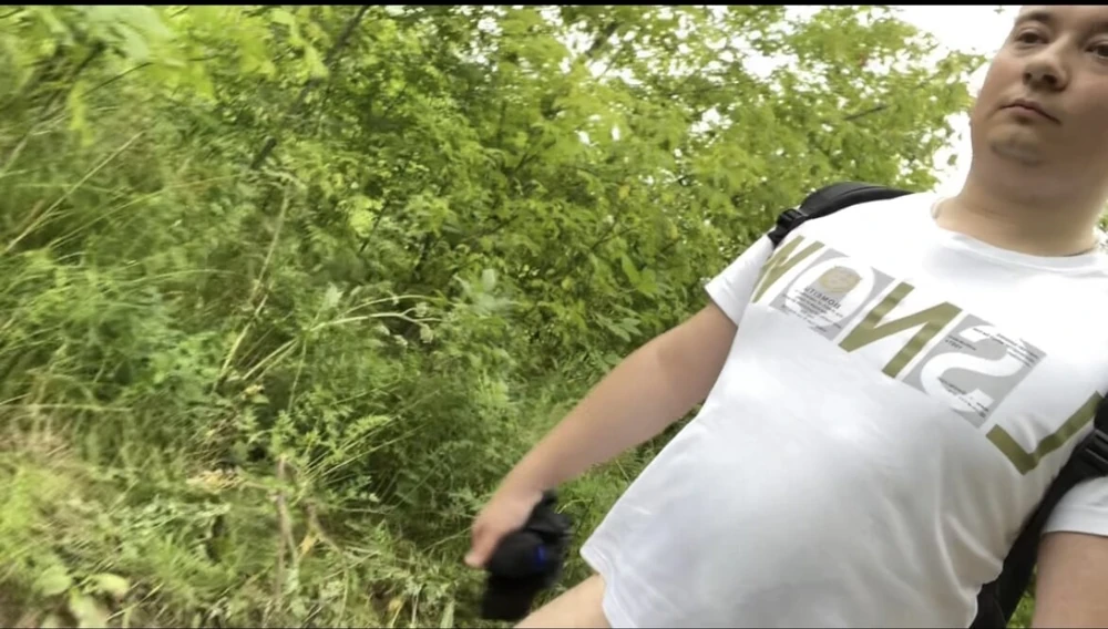 A photo of a naked walk in the summer forest #6