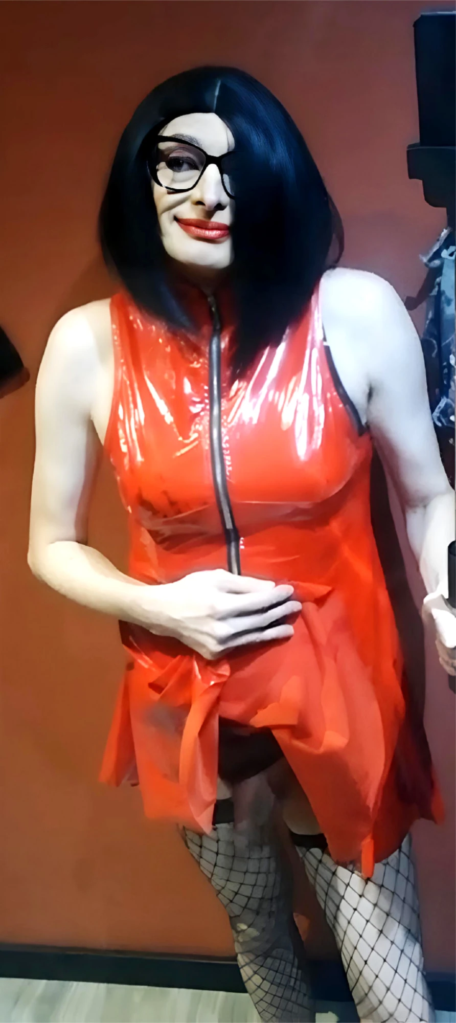 female dog in latex