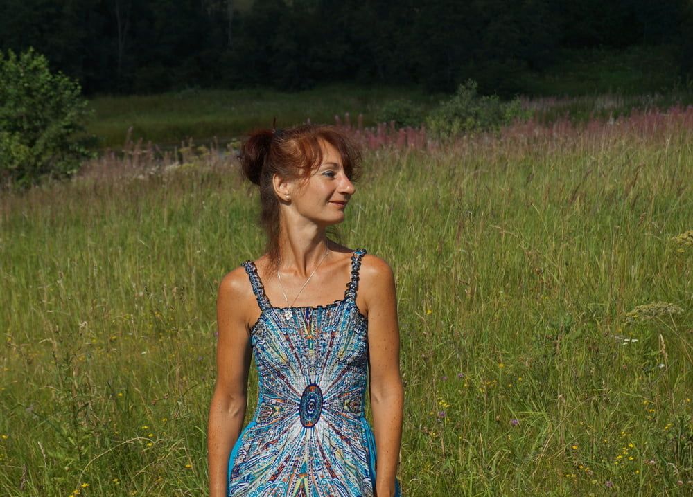 In blue dress in field #13