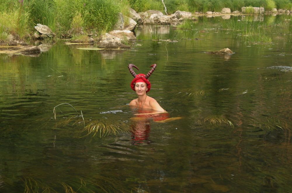 With Horns In Red Dress In Shallow River #36