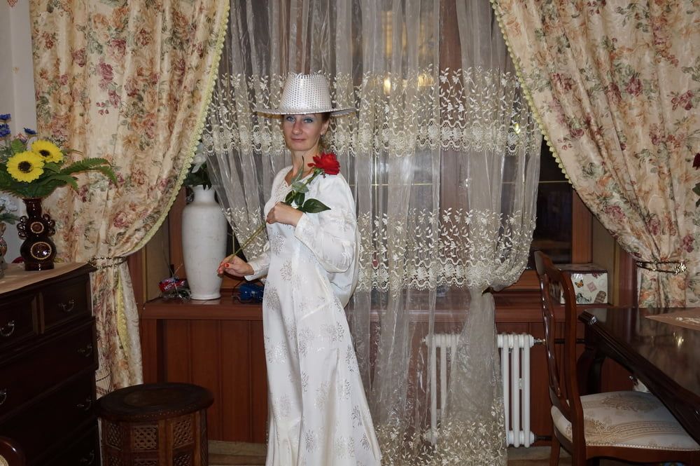 In Wedding Dress and White Hat #51