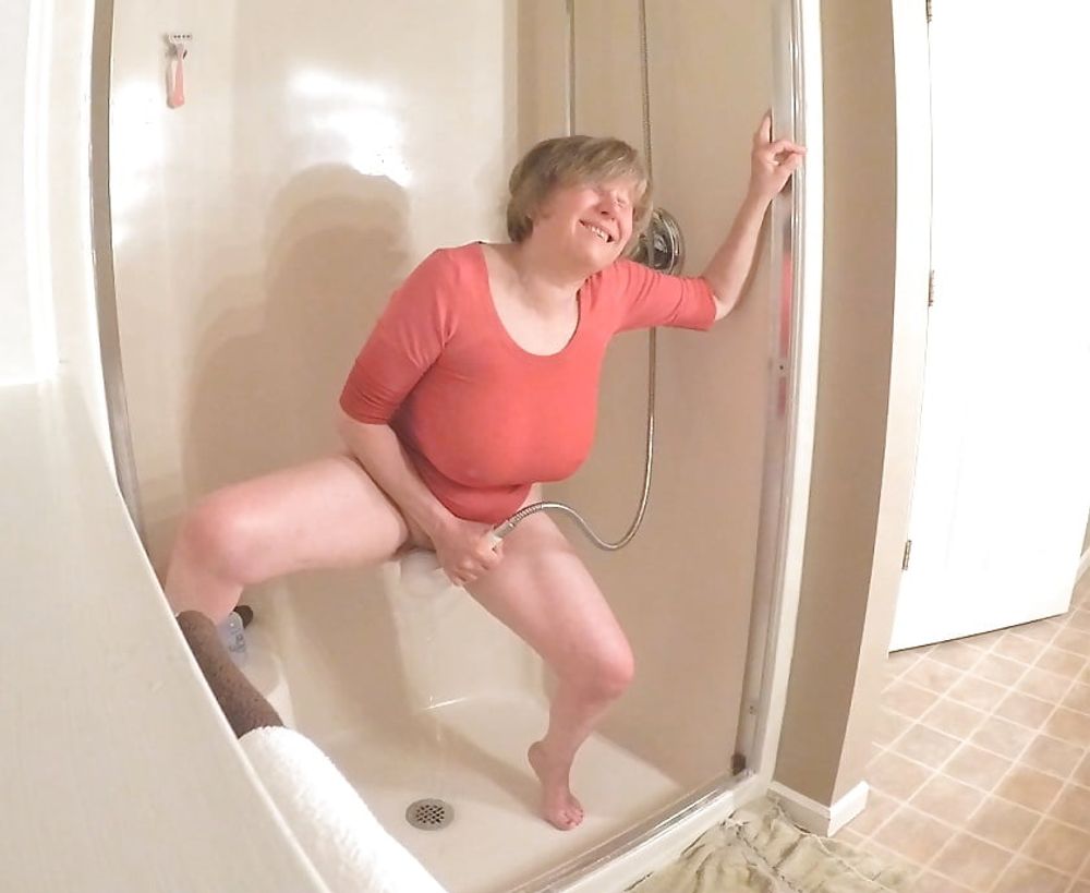 GILF masturbates in wet t-shirt #6