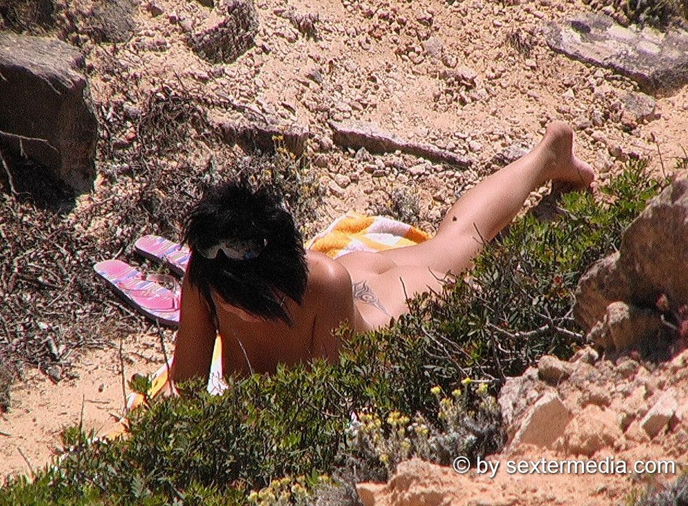 Bruinette alone naked while sunbathing #15