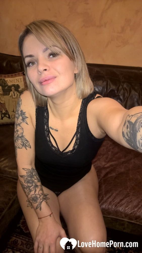 Cute tattooed beauty flashes her amazing tits #12