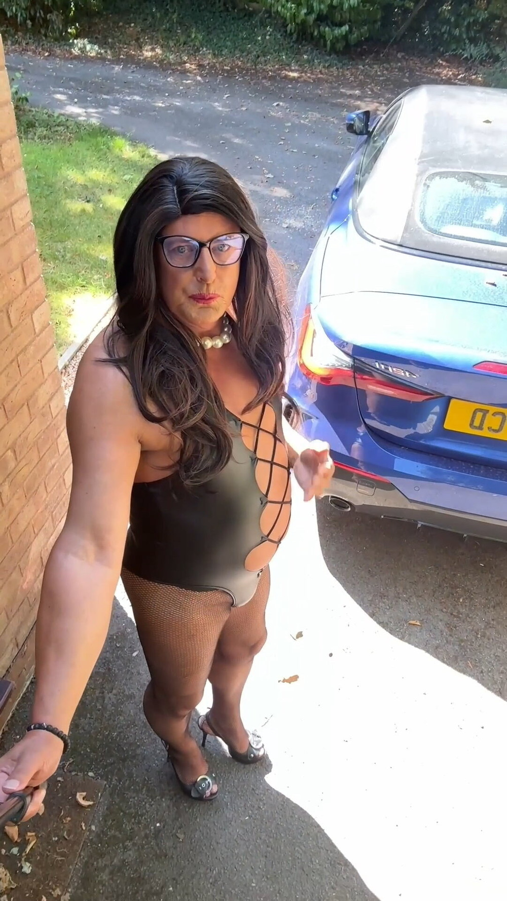 Sexy Crossdresser kellycd2022 in black pvc bodysuit and heel #44
