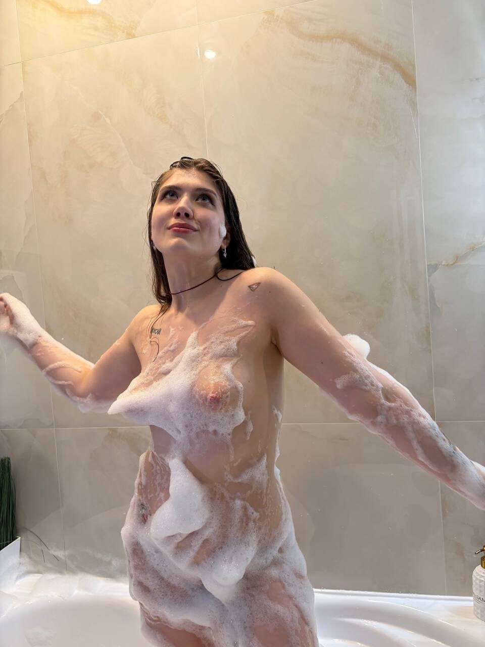 submissive teen touches her pussy in bubble bath
