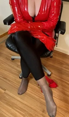 black spandex leggings and red high heel mules         