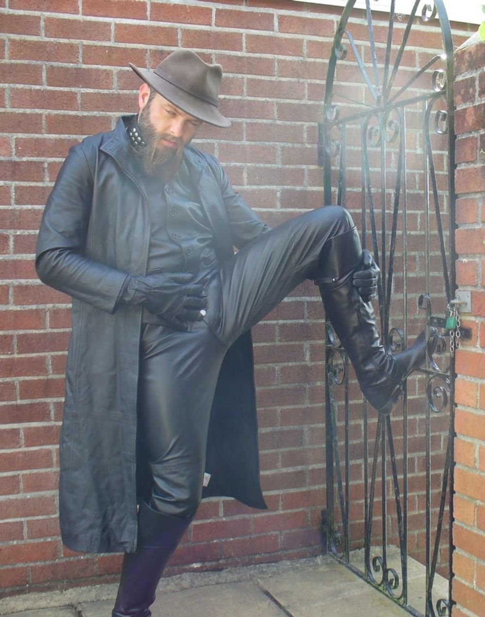 Leather Master outdoors in leather coat and boots #6