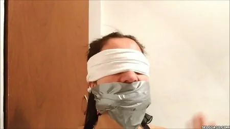 self gagged latina mom with a mouthful of socks selfgags         