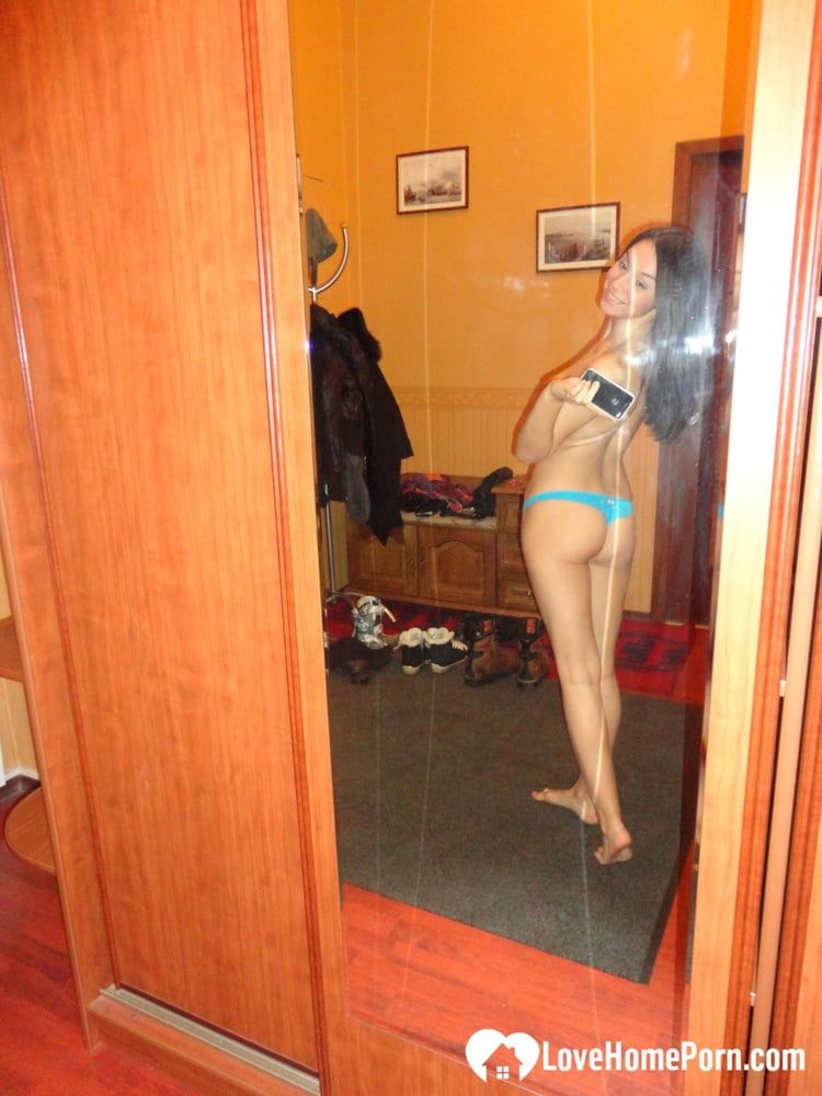 Hot teen shows her body in the mirror #17