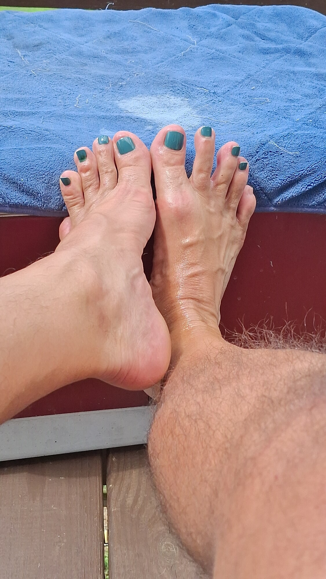 My bare feet with nail polish and sandals