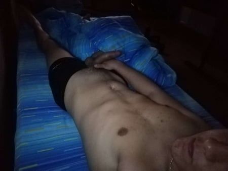 in bed alone