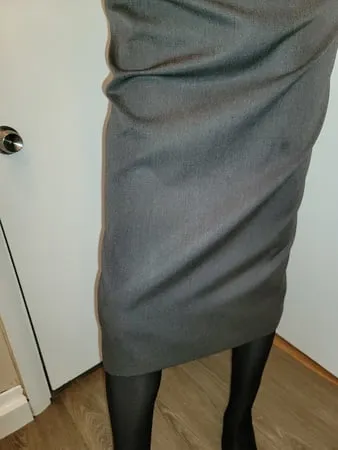 grey pencil skirt with black silky half slip         