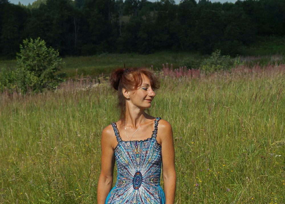 In blue dress in field #12