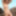 Diana Jam takes off her sexy bikini on the rocks by the seashore #18