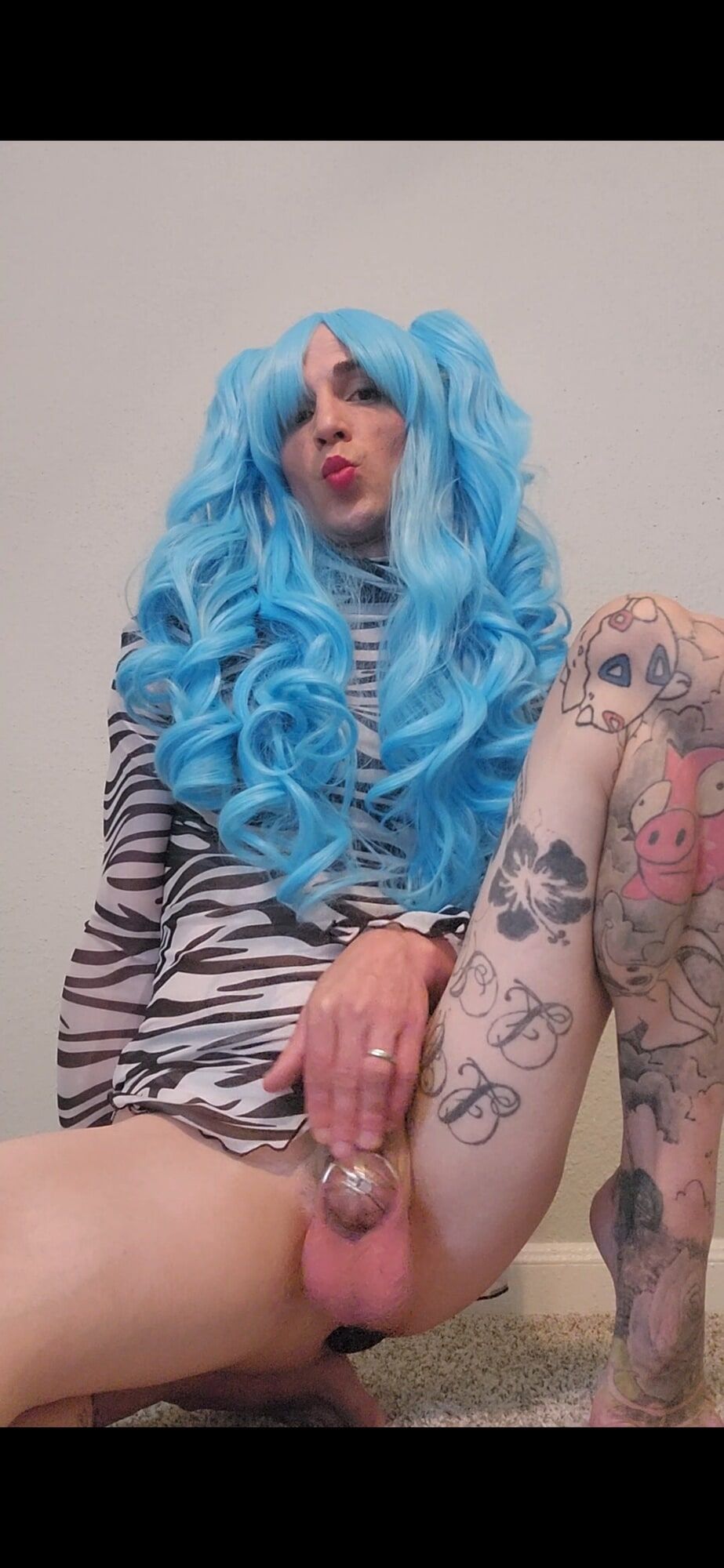 Blue wig and zebra print dress