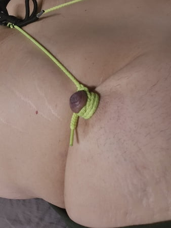 Bad girl gets her nipples stretched