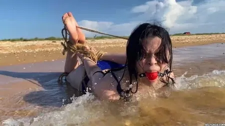 hogtied and ball gagged in sea water selfgags         