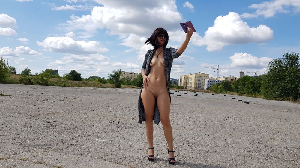  Marisha walks naked on the auto-polygon and films herself o #38
