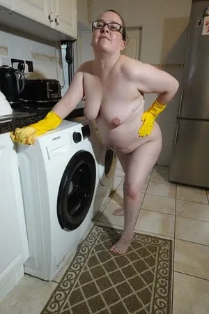 naked cleaning in rubber gloves         