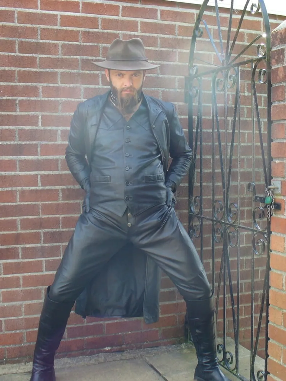 Leather Master outdoors in leather coat and boots #5