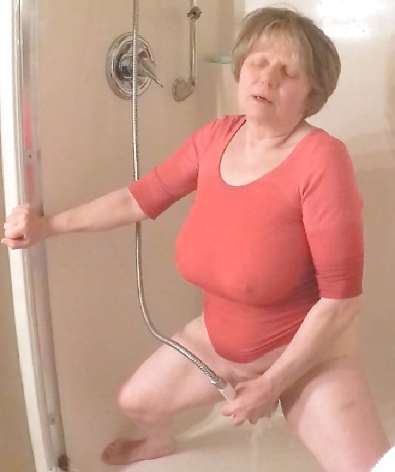 GILF masturbates in wet t-shirt #9