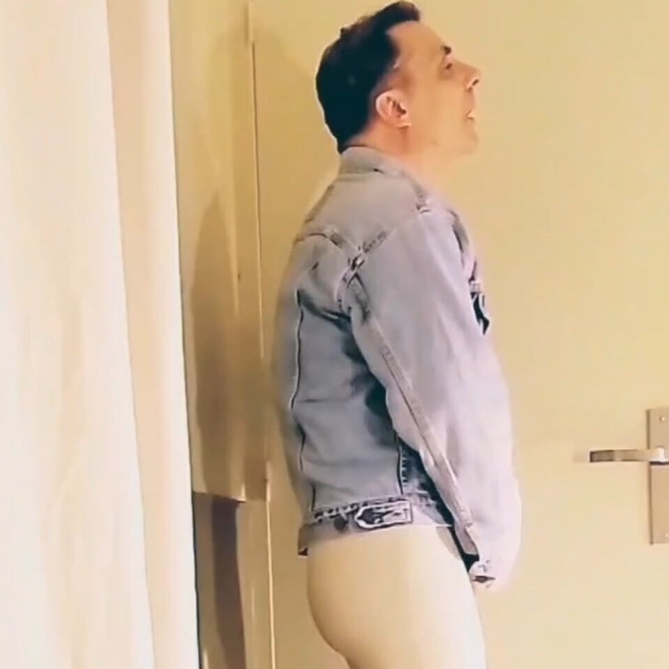 Arousal in white vinyl leggings #3
