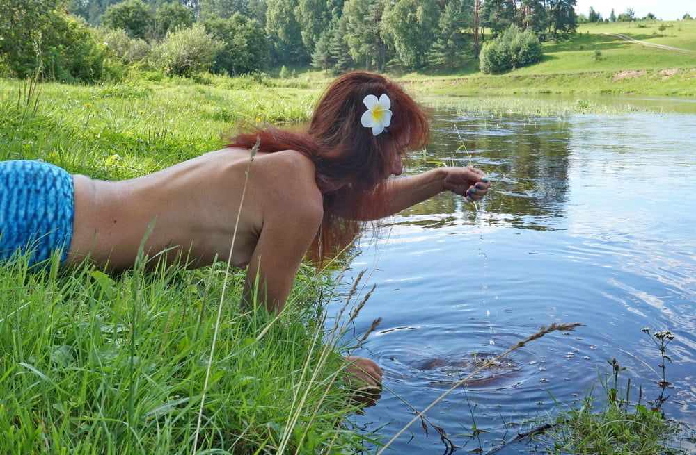 Mermaid plays with water #35