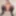 Cuffed beauty in stockings uses a bottle