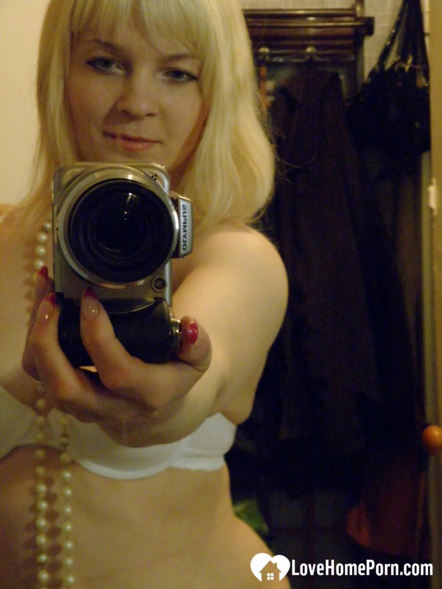 Aroused blonde in stockings taking naughty selfies #3