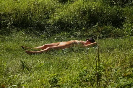 nude on green grass         