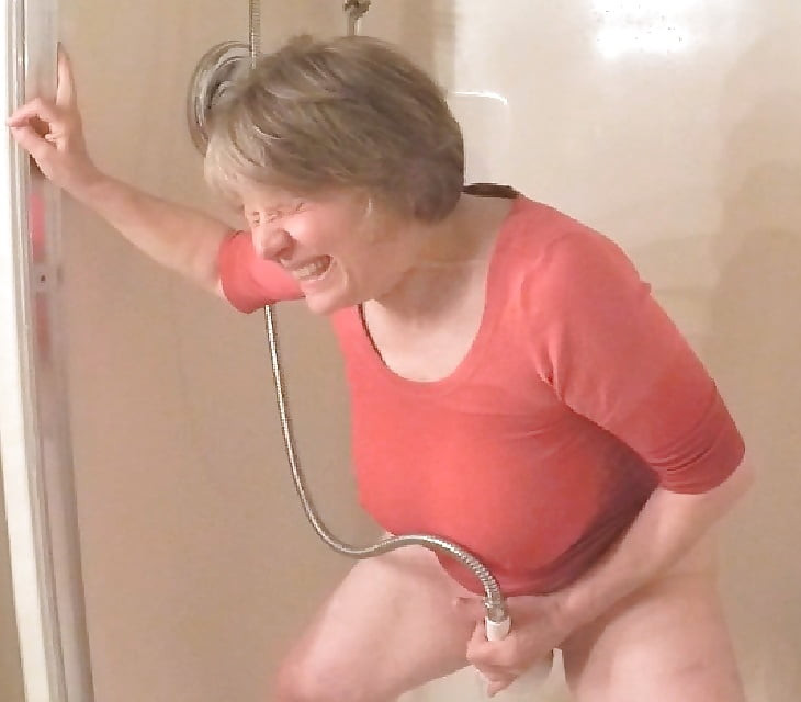 GILF masturbates in wet t-shirt #6