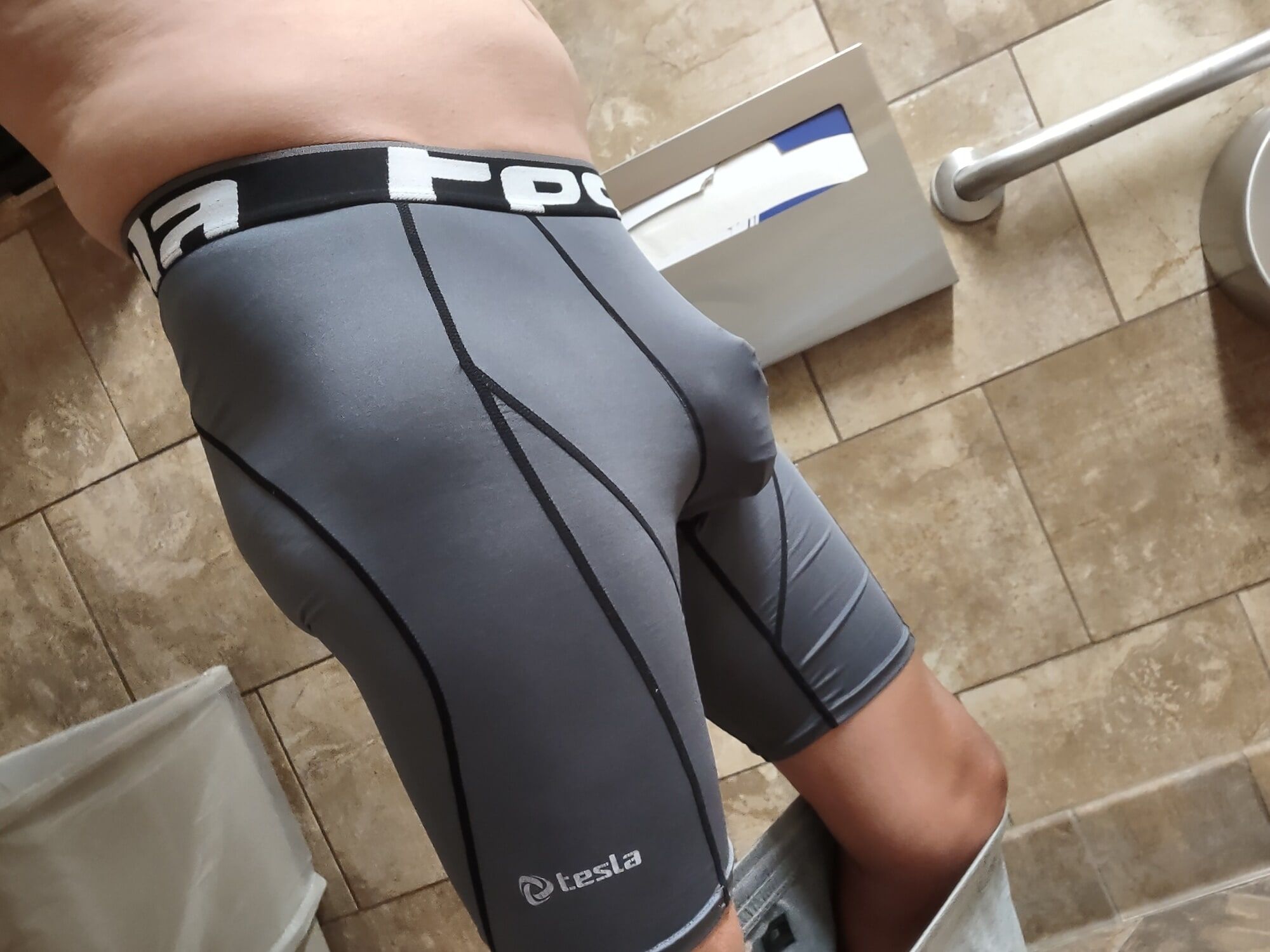 Wearing my cock cage in my spandex compression underwear 