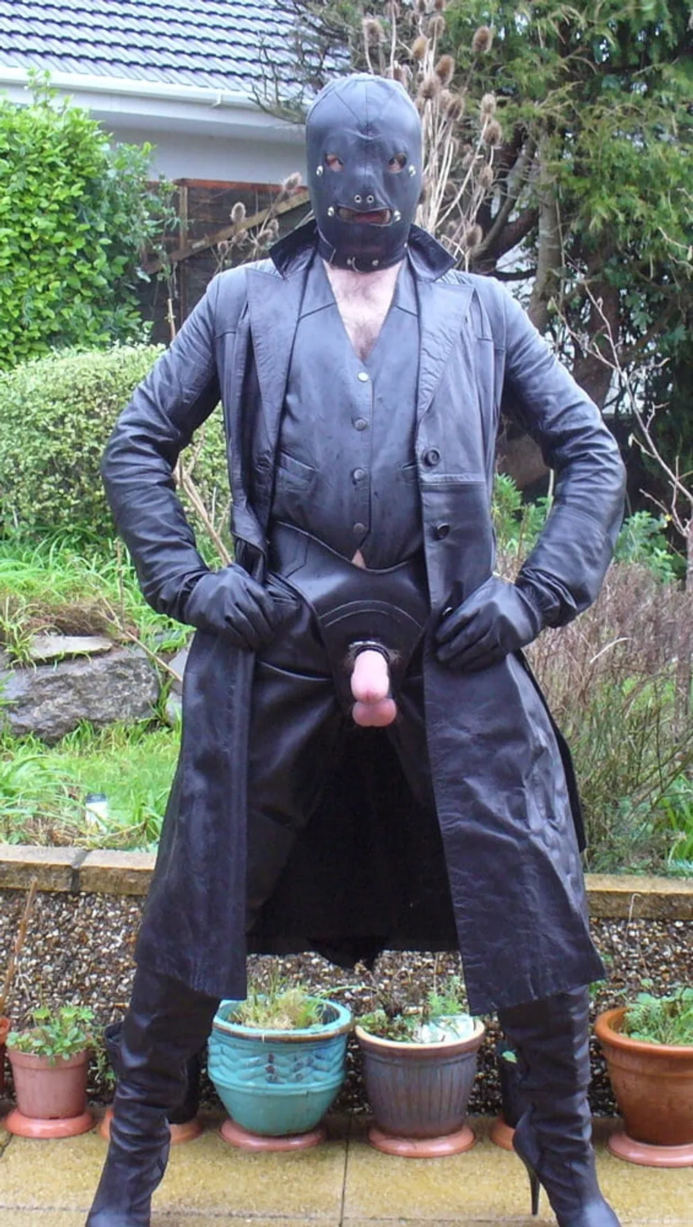 Leather Master in cock harness, boots and hood #4