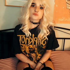 Metalhead showing off her goods