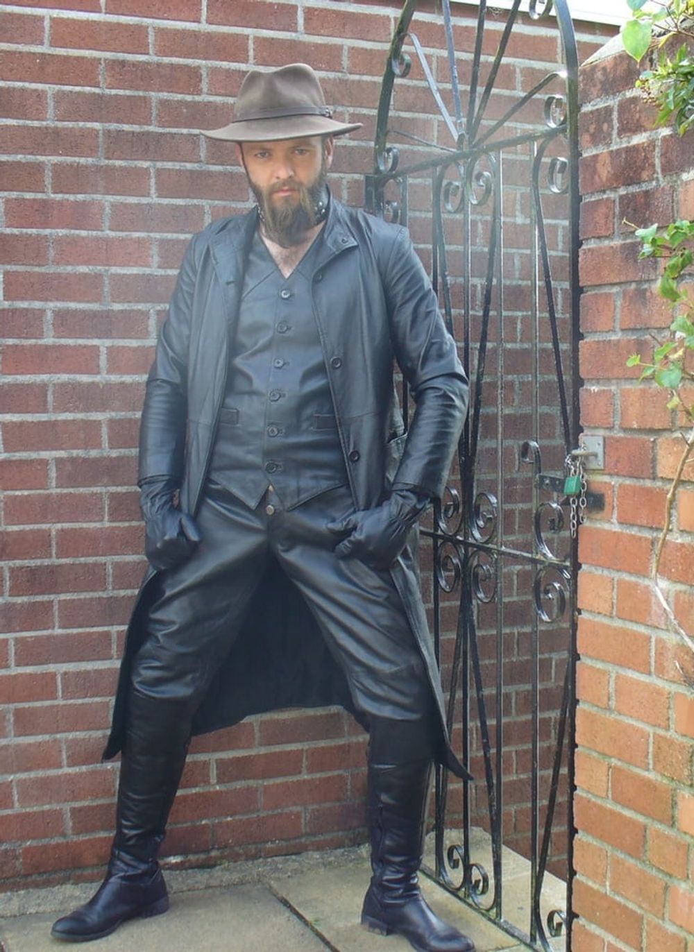 Leather Master outdoors in leather coat and boots #3