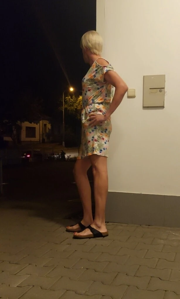 Teen chubby crossdresser outdoors.