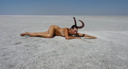 lying naked on the salt of the saltlake elton russia         