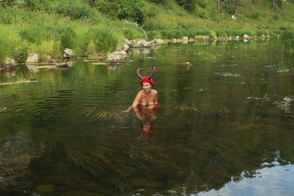 With Horns In Red Dress In Shallow River #57