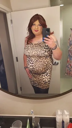 leopard bodycon and black stockings         