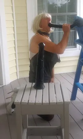 black top and white skirt on porch         