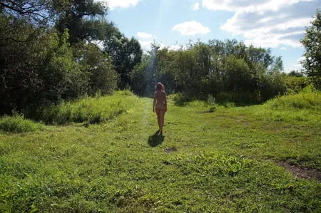 nude on green grass         