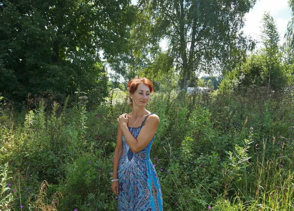 In blue dress in field #9