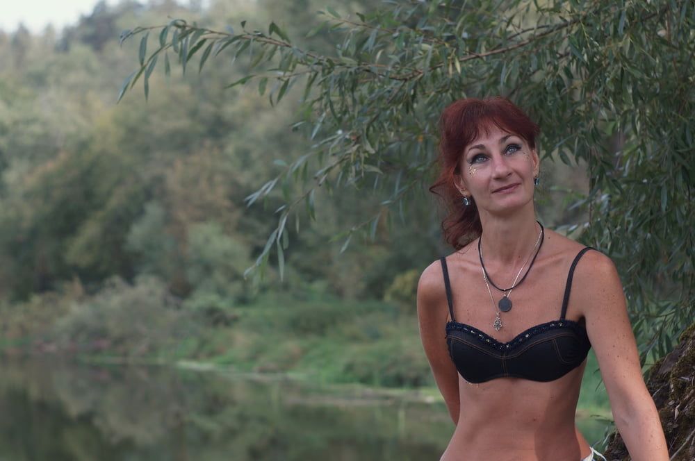 Black bikini near tree upon river #7