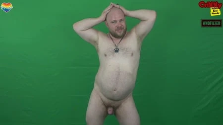 Gay pierced, unshaven bear shows himself naked