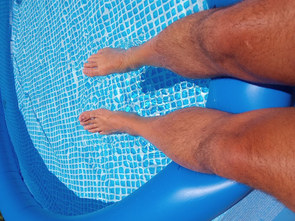 My bare feet and hairy legs getting a tan #6